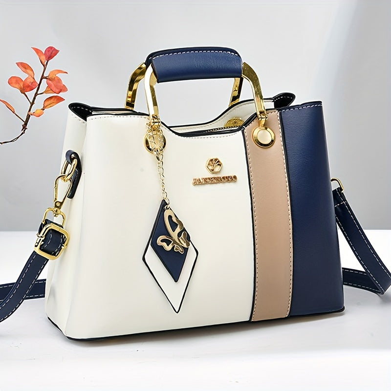 Chic navy blue, white, and beige colorblock tote with golden hardware, adjustable strap, magnetic closure, spacious interior, and lightweight design - perfect for daily use.