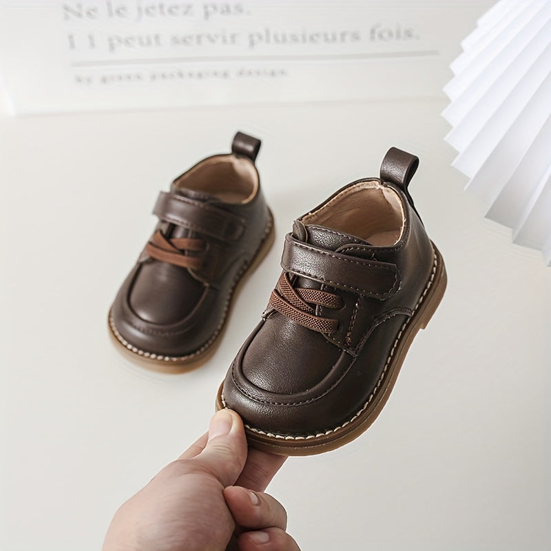 Kids British-style striped tassel crib shoes for toddlers, with lightweight microfiber synthetic upper and TPR sole for all-season wear in spring and fall.