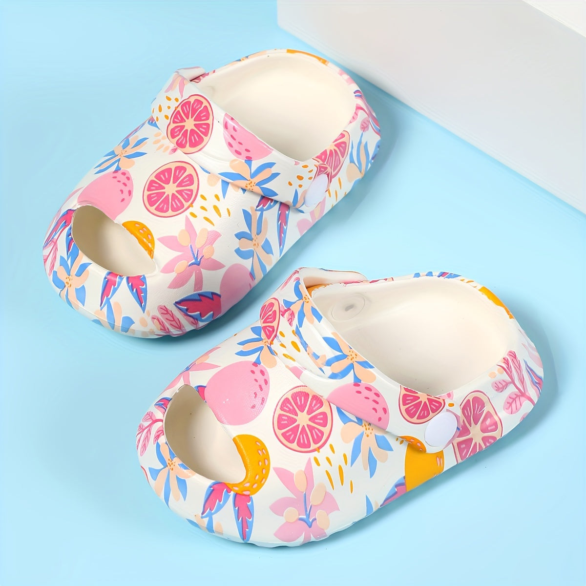 Stylish patterned clogs for girls, perfect for indoor and outdoor wear.