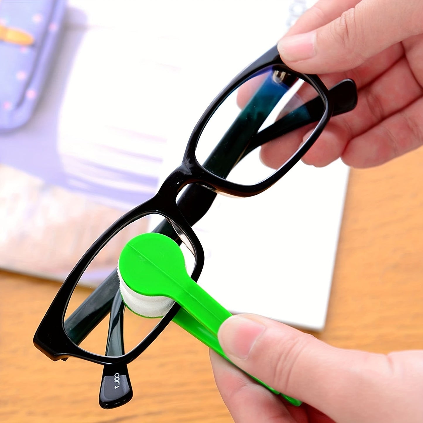 Portable multifunctional glasses cleaning brush with soft microfiber wipe. Includes scratch-free lens cleaning brush with keychain hole. Perfect polishing tool for glasses. Available in 1, 2, or 6 piece sets.