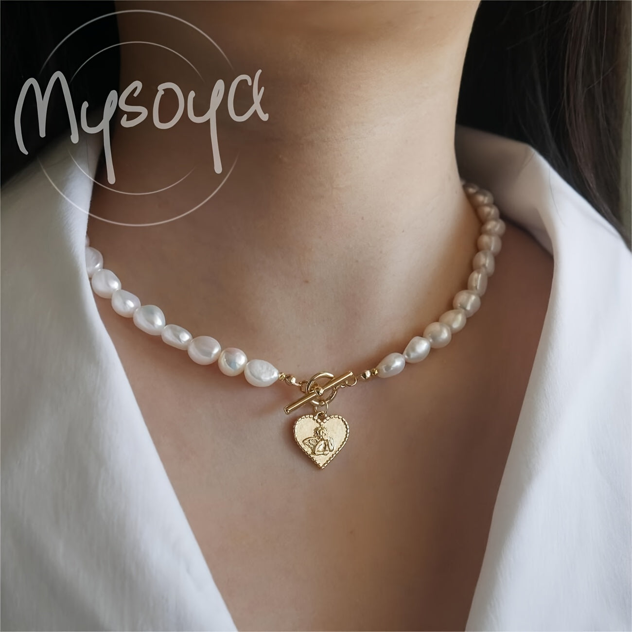 This elegant necklace features a handcrafted Baroque freshwater pearl with a golden heart pendant. Measuring 7-8mm, it comes in a beautiful gift box, making it a perfect gift for birthdays, anniversaries, Valentine's Day, and any special occasion.