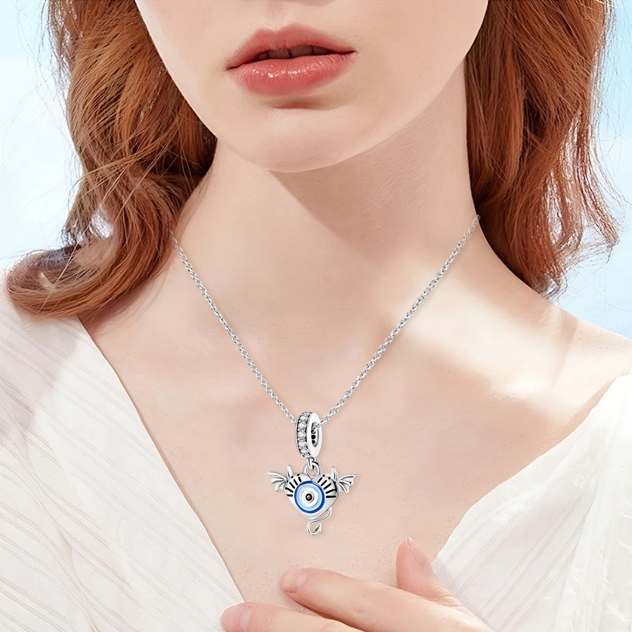 Silver-plated devil pendant with blue eyes, suitable for bracelets and necklaces. Made with cubic zirconia, perfect for DIY jewelry making or gifting. Featuring a unique and original design, this simple yet fashionable piece is ideal for women's birthday