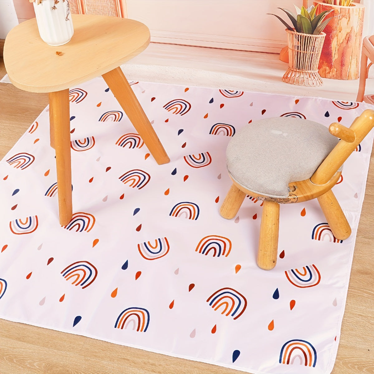 The Happyflute Waterproof Splat Mat is a versatile accessory designed to protect floors from spills and messes. This indoor high chair floor protector is washable, anti-slip, and portable. Measuring 43''X43'' (110X110cm), it can also be used as an