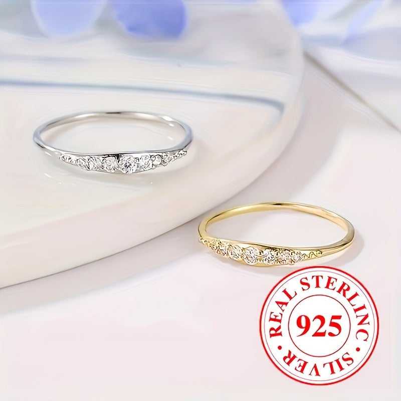 Elegant jewelry for brides' wedding and engagement parties, a delicate zirconia ring crafted from 1 gram of 925 sterling silver.