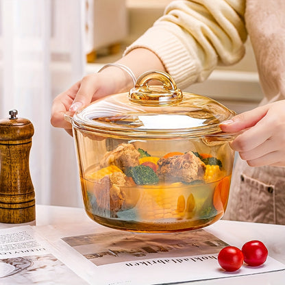 A durable 2500ml borosilicate glass soup pot with lid that is resistant to high temperatures. This pot is microwave and dishwasher safe, making it perfect for preparing fruit salads and other dishes in the kitchen.