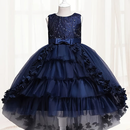 Elegant sleeveless dress with tiered mesh tutu, fake pearls, bowknot, and floral design for parties and balls.