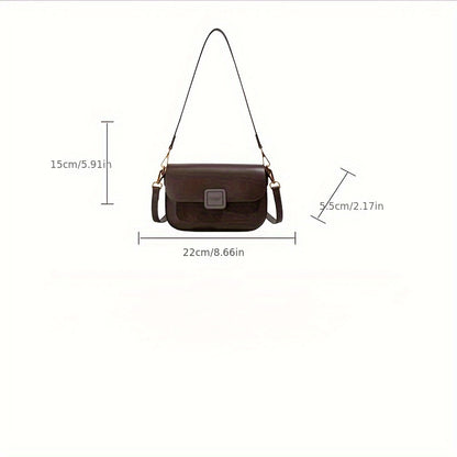 Stylish black crossbody bag with zip closure, made of durable PU material, inspired by retro design.