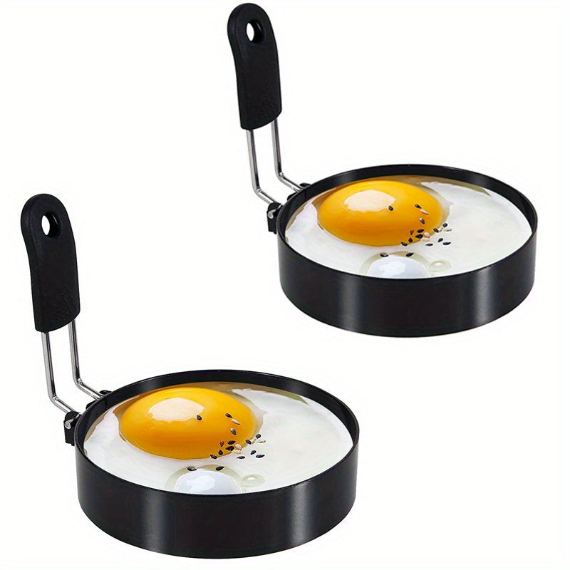 Two stainless steel egg cooking rings with a diameter of 10.16cm, perfect for frying eggs and making omelets. These egg rings can also be used as a pancake mold. A versatile kitchen gadget that is a must-have for any home kitchen.