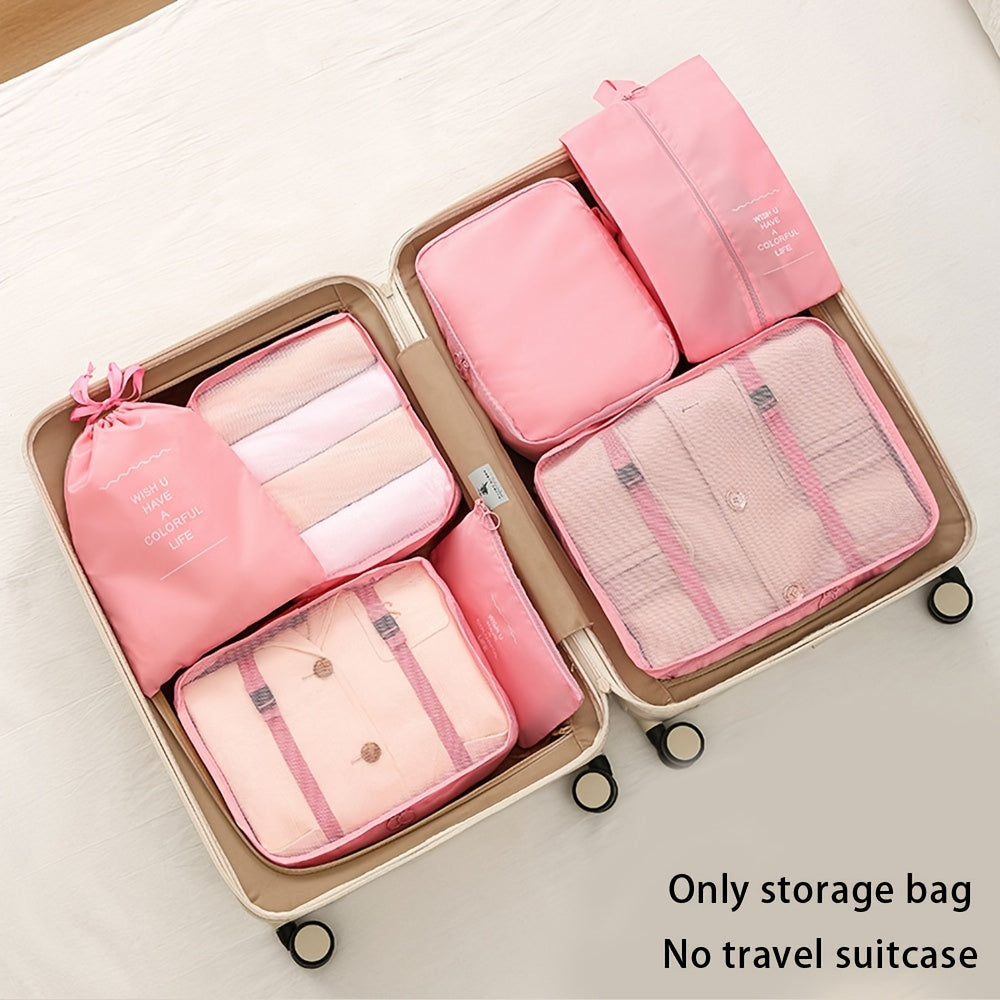 Waterproof travel organizer bag, includes seven pieces for clothes, pants, shoes, and socks.