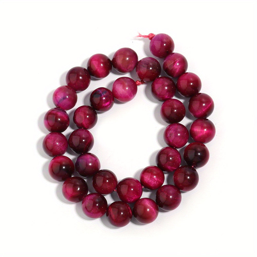 Smooth round beads of natural rose red Tiger's Eye in various sizes (4/6/8/10/12mm) for DIY jewelry making bracelets and necklaces.