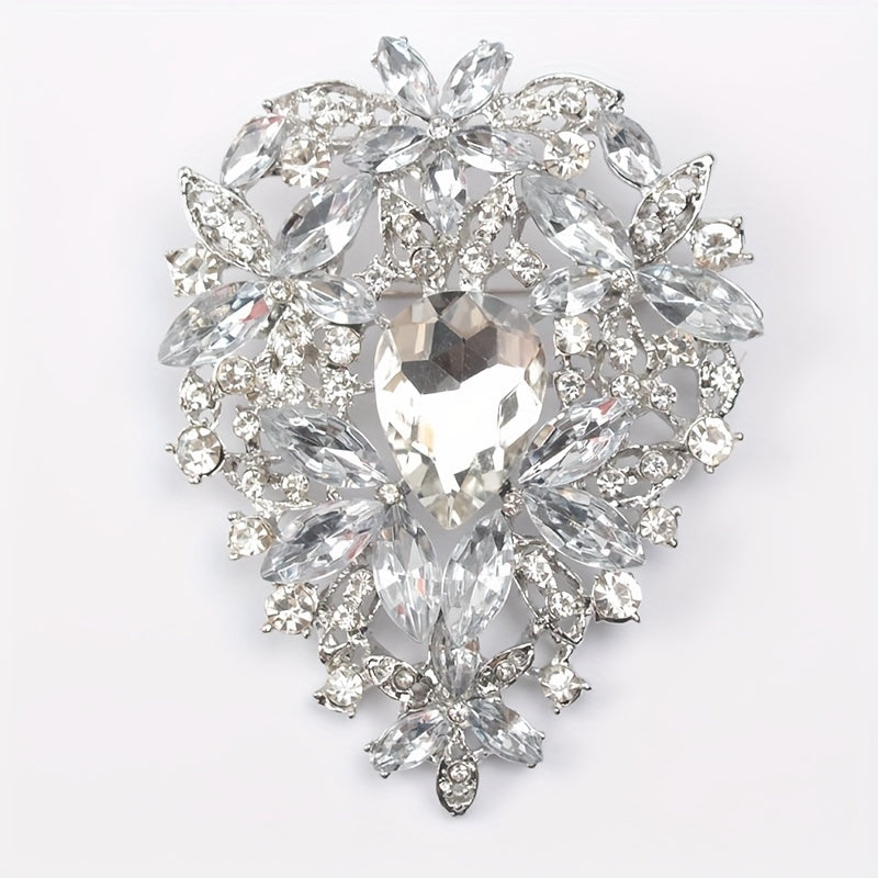 Add a touch of vintage elegance with this stunning Rhinestone Brooch Pin featuring an irregularly shaped large crystal glass design. Perfect for embellishing clothing and adding a luxurious touch to your fashion ensemble.