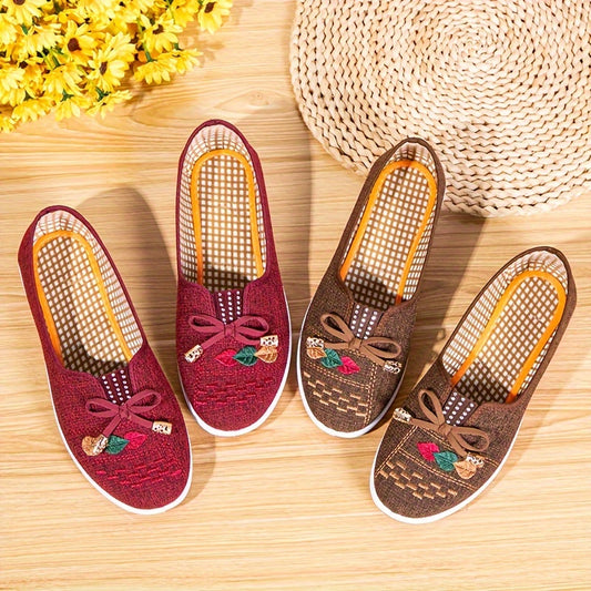 Comfortable women's solid color flats with bowknot decor and soft soles, ideal for casual walking.