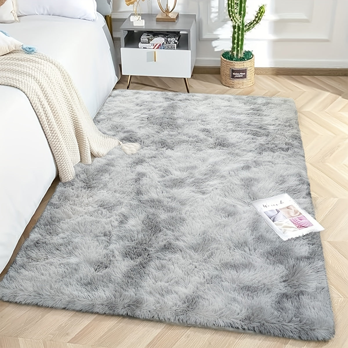 Soft, fluffy shag area rug perfect for living room or bedroom decor. This non-slip machine washable carpet adds luxury and coziness to any space.