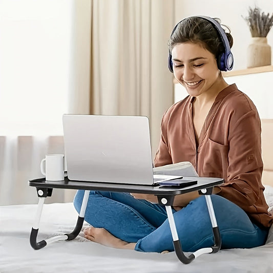 No need for electricity, this black Classic Wooden Adjustable Folding Laptop Desk is a portable knee table perfect for bed or sofa use. Its compact design makes it a great bedside writing workstation.