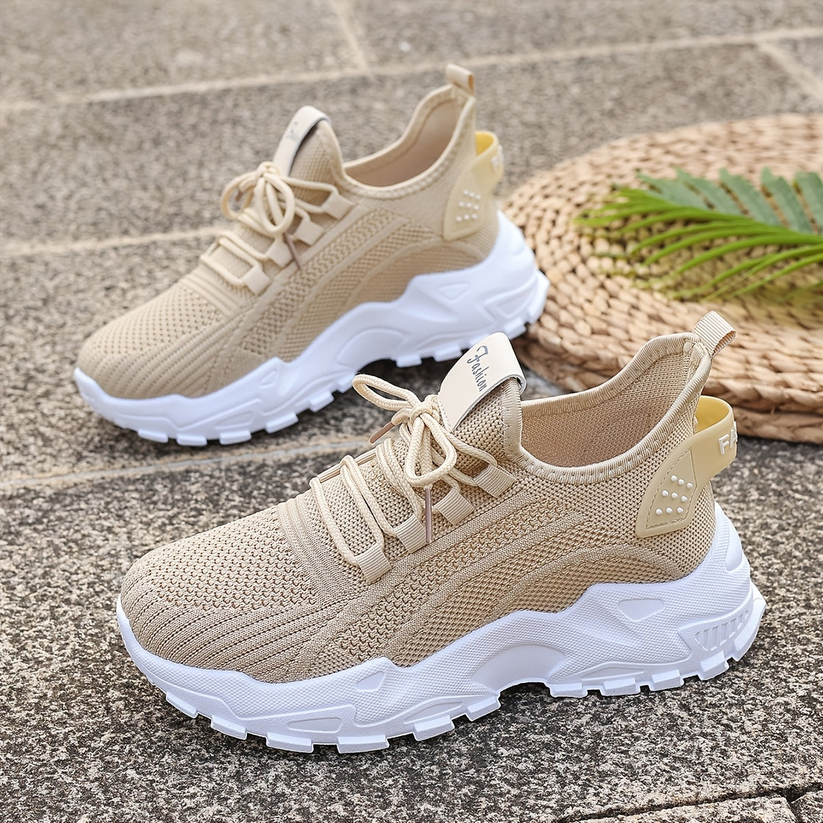 Breathable knit sneakers for women: lightweight, comfortable, low-top running shoes with soft soles for all seasons.