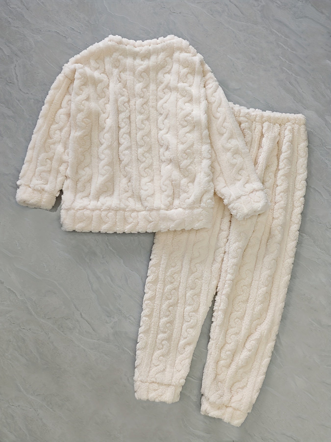 Warm and cozy plus size women's pajama set with cute bear embroidery, featuring long sleeves and flannel pants for winter sleepwear.