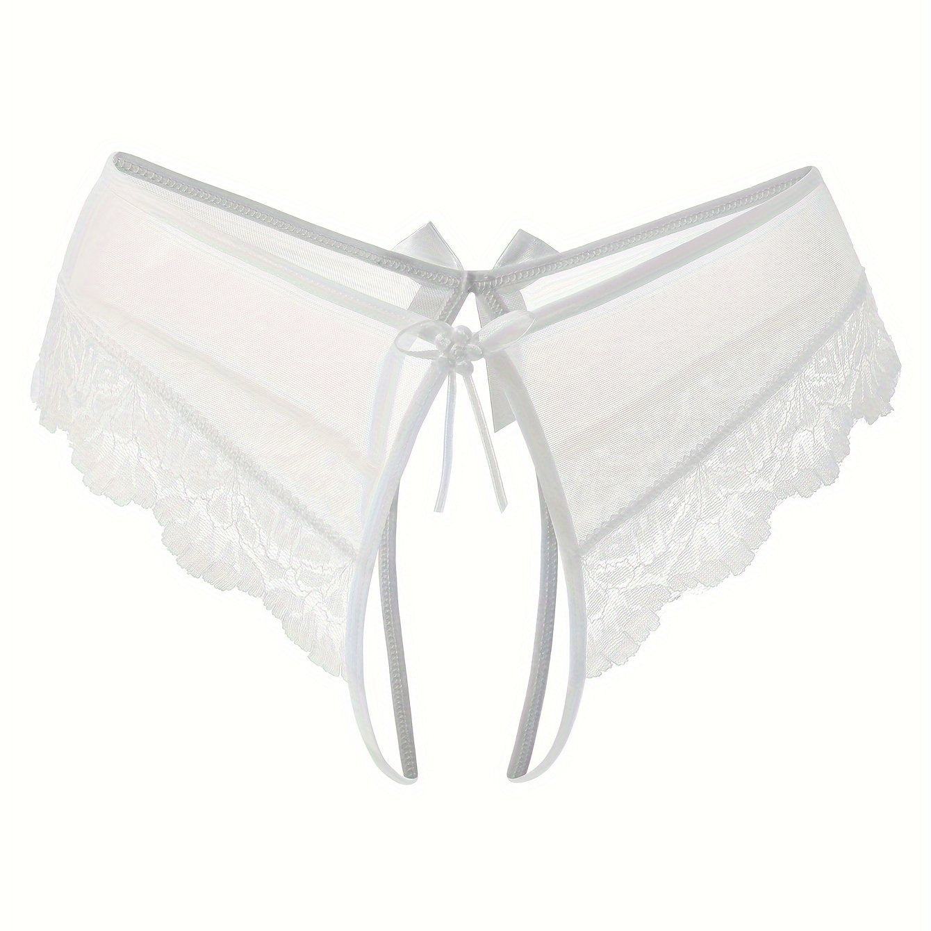 Transparent lace thong briefs with open crotch, low-rise design. Made of 90% polyamide and 10% elastane knit fabric, weighing 111 gsm.