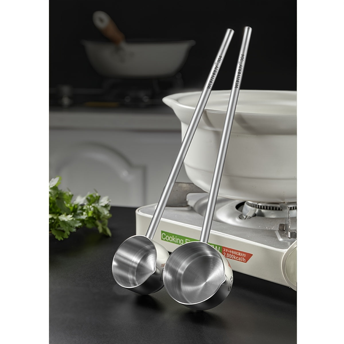 Stainless steel long-handled soup spoon with cute bear pattern; anti-scald and oil splash guard for kitchen and restaurant use; made of 304 stainless steel; also serves as a sauce spoon.