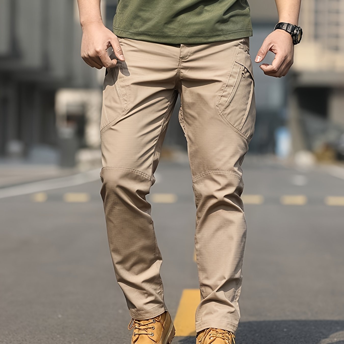 Men's olive green tactical cargo pants made of durable polyester with multiple pockets, perfect for hiking and outdoor adventures. Machine washable and ideal for camping gear.