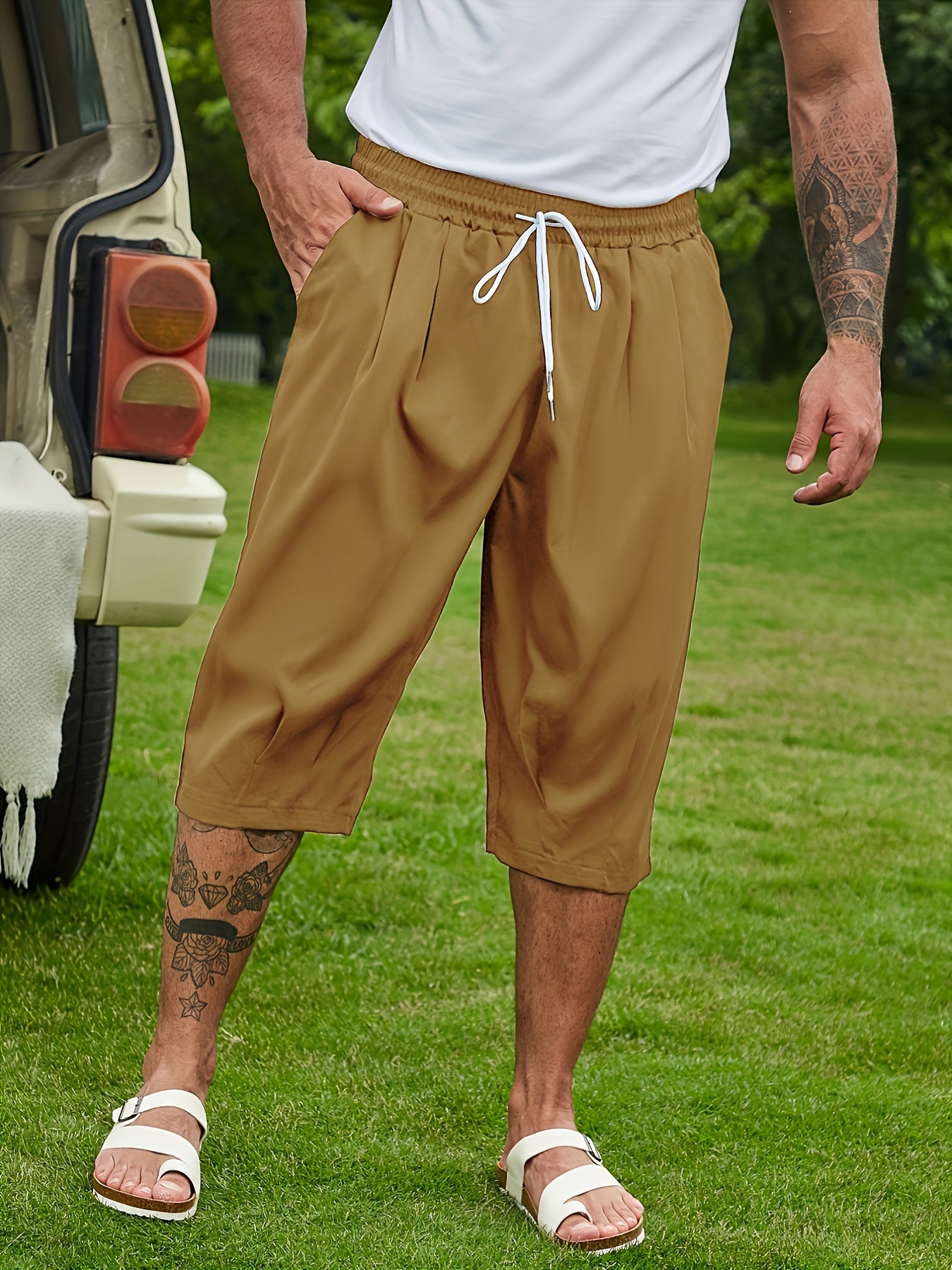 Breathable loose-fit solid capri pants for plus-size men, perfect for summer.