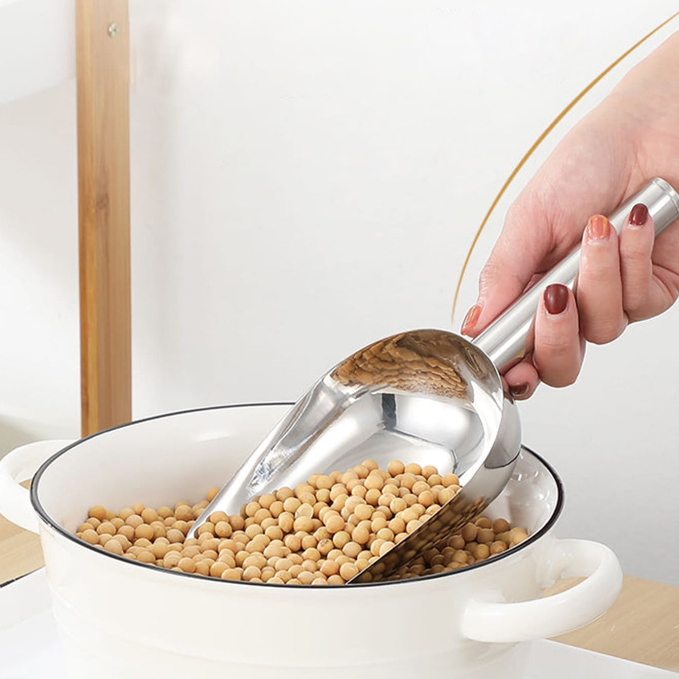 Stainless steel ice scoop for kitchen utility, suitable for ice, tea, coffee, flour, soybeans, popcorn, and candy.