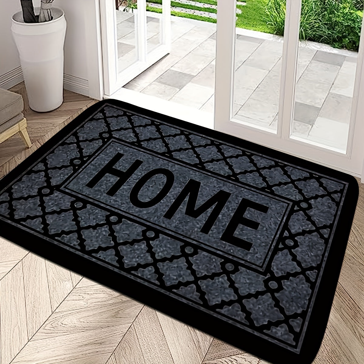 This kitchen flooring mat features a striking black foam design with irregular stripes and the word "HOME" pattern. Made of soft, thick flannel material, this non-slip mat is constructed from 1.2 foam sponge, making it ideal for bathroom and indoor