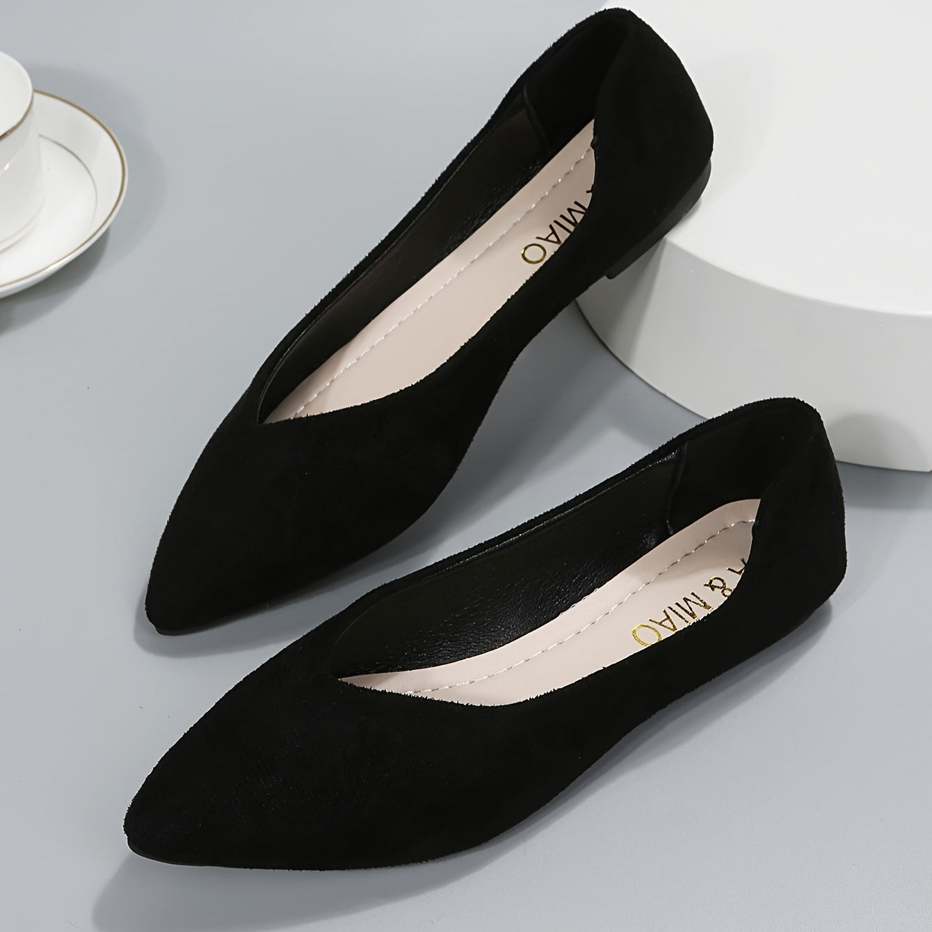 New fashion black point toe flats for plus size women, suitable for daily wear with lightweight and comfortable design.