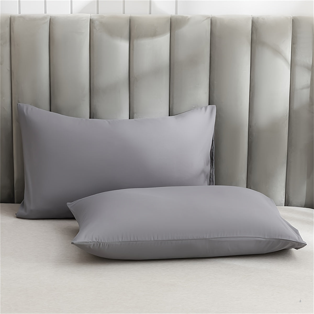 Soft and plush pillowcase with a solid color design, featuring a thick and cozy feel. Includes an envelope closure and is machine washable, making it ideal for creating a comfortable bedroom atmosphere.