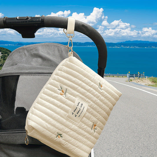 Travel in style with our Embroidered Cotton Travel Carry Bag designed specifically for strollers. This multi-function organizer features compartments for bottles and diapers, providing convenient storage for parents on the go. Suitable for ages 14 and