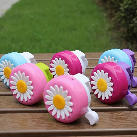 Colored bicycle bells featuring chrysanthemum and fun designs.