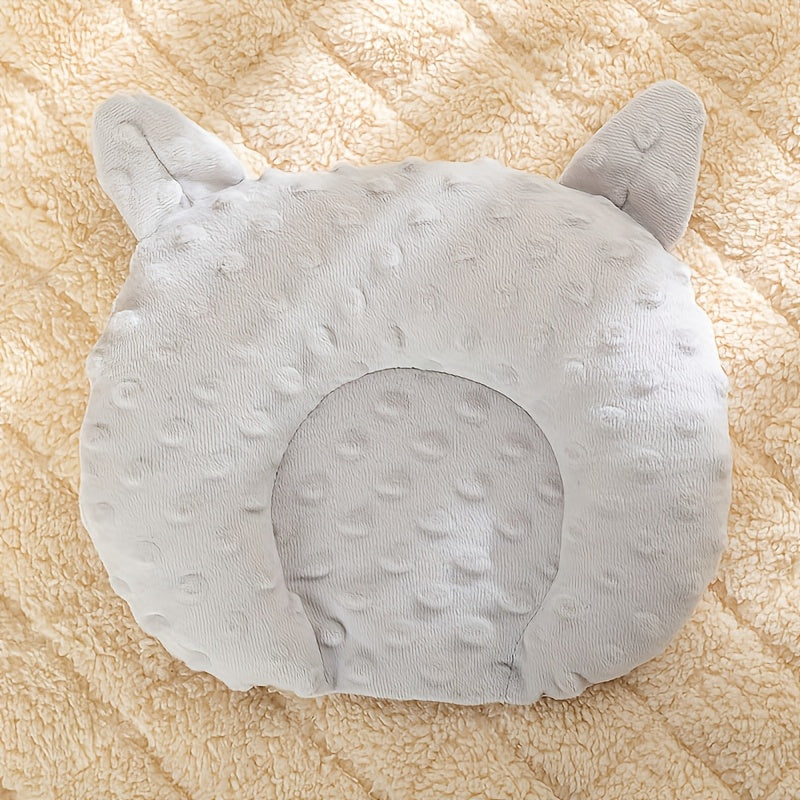 Small dog sleep pad with u-shaped cartoon design. Made of polyester fleece with solid pattern, perfect for toy breeds.