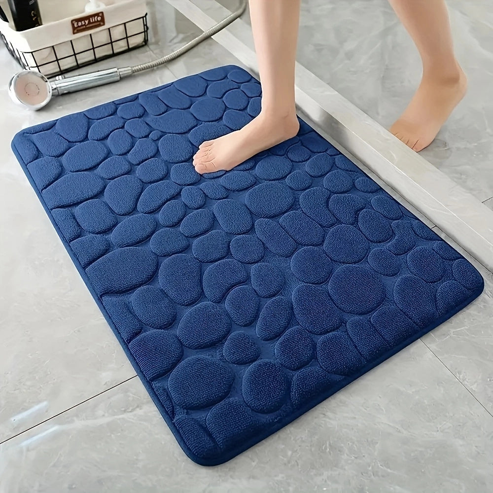 Soft, memory foam bath rug with cobblestone embossment. Rapid water absorbent, non-slip, and washable. Ideal for shower rooms, bathrooms, kitchens, bedrooms, and as decorative accessories.