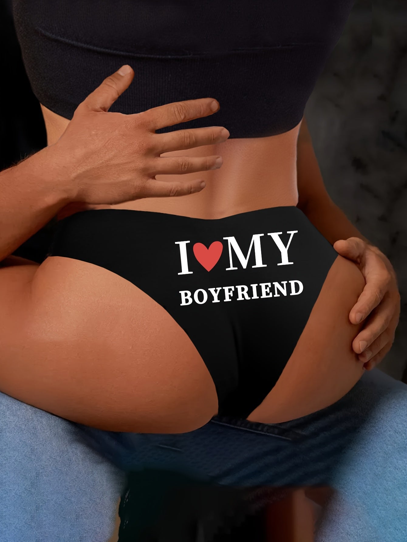 Stretchy thong with 'I LOVE MY BOYFRIEND' in white letters, ideal for Valentine's Day.