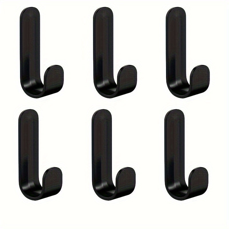 6 J-shaped hooks for hanging clothes on doors or walls without damaging them.