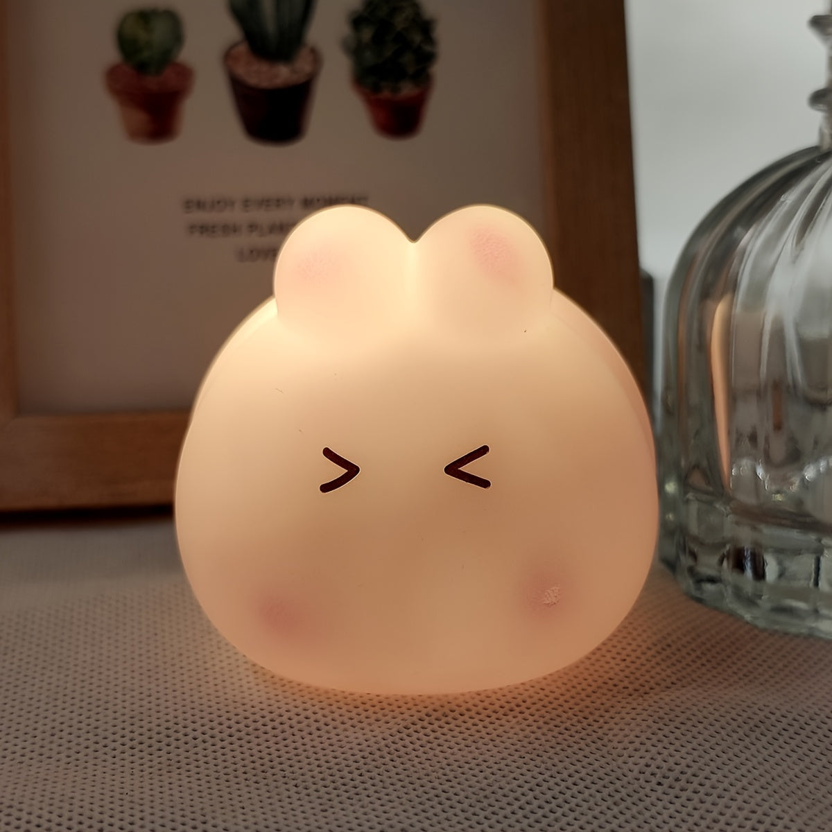 Adorable rabbit LED lamp, perfect for bedroom decor or gifting to friends and family for holidays and birthdays. Compact, portable, and powered by button batteries.