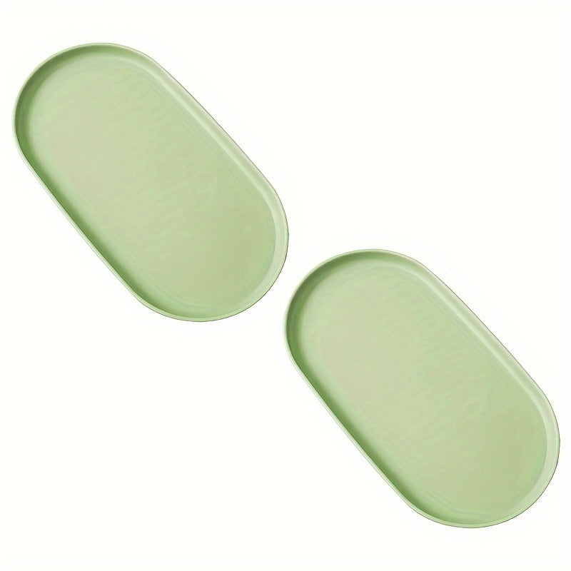 2-piece set of oval PP plastic serving trays for desserts and pastries, ideal for home, restaurants, and cafes.