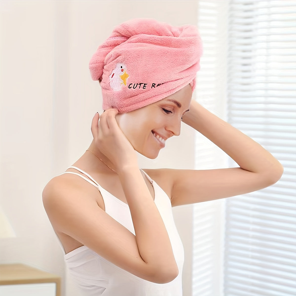 Ultra-absorbent microfiber hair towel wrap in cute cartoon designs - quick dry, lightweight shower cap for women. Available in blue, purple, yellow, pink. Soft and comfortable polyester blend.