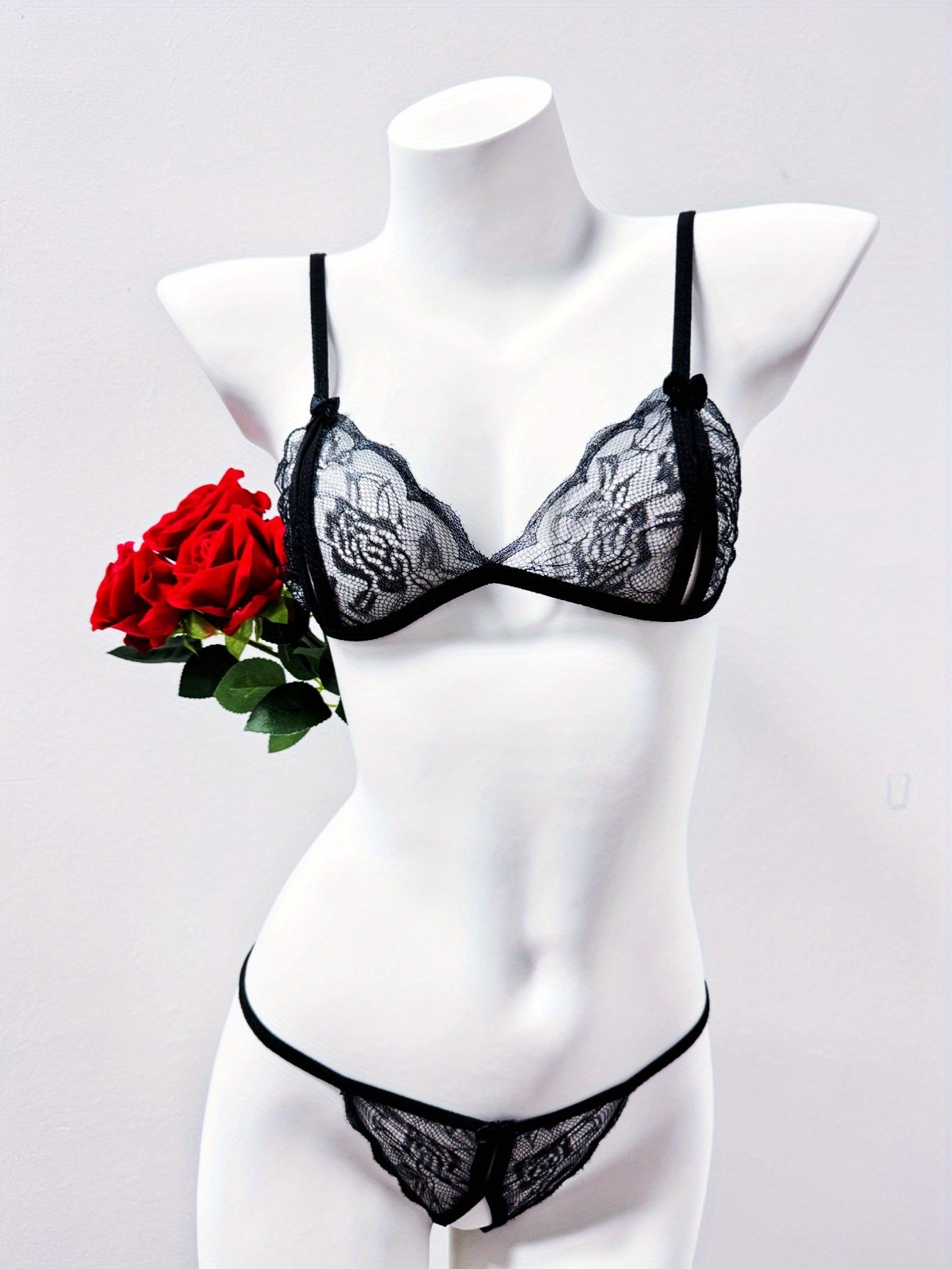 Attractive lingerie sets, bras, and crotchless panties for women.