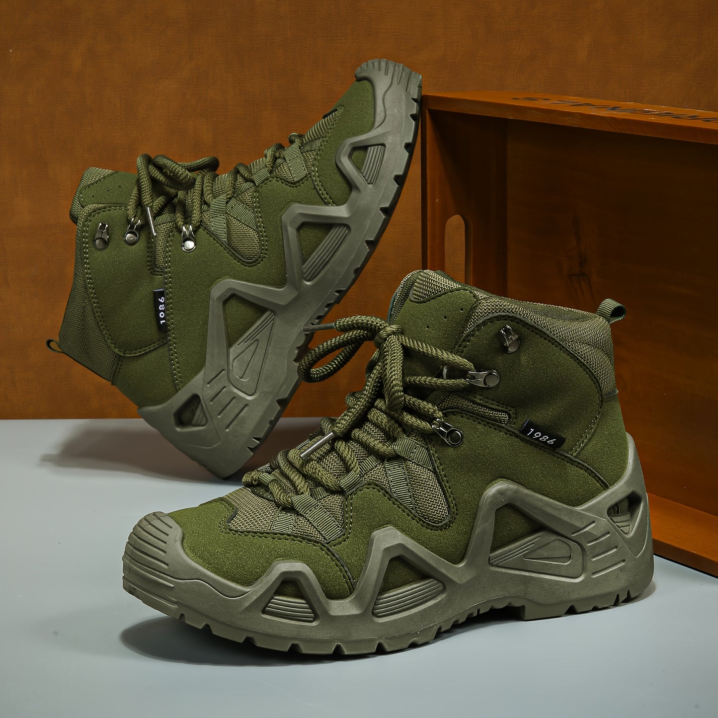 Men's durable, breathable, vintage-inspired hiking boots with a rugged sole in green high-top design for all-season outdoor adventures.