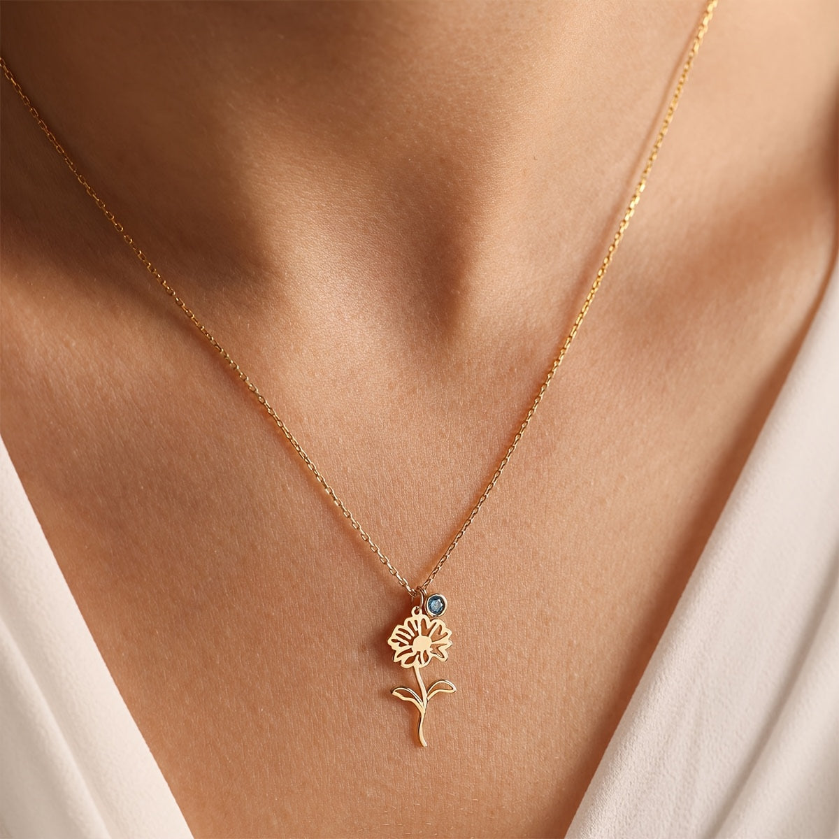 Customize your own Birth Flower Pendant Necklace for Women, crafted with 18K Gold Plated Stainless Steel. Add a Birthstone to create a unique piece. Its elegant and simple style makes it the perfect gift for any occasion, whether it be daily wear or