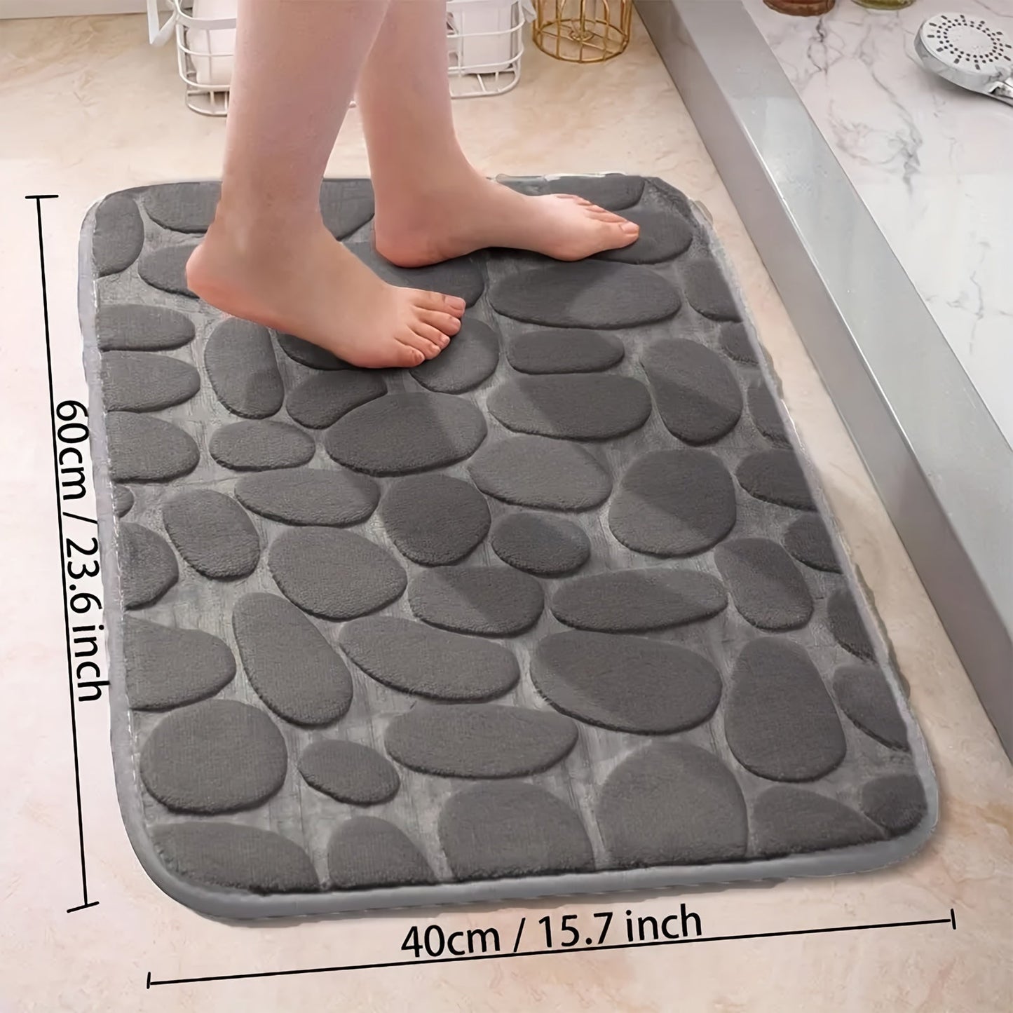 Soft and comfortable Plush Memory Foam Bath Rug featuring Cobblestone Embossment. This quick-dry, non-slip rug is machine washable and perfect for showers and bathrooms. Add a touch of luxury to your space with this ideal fall decor accessory.