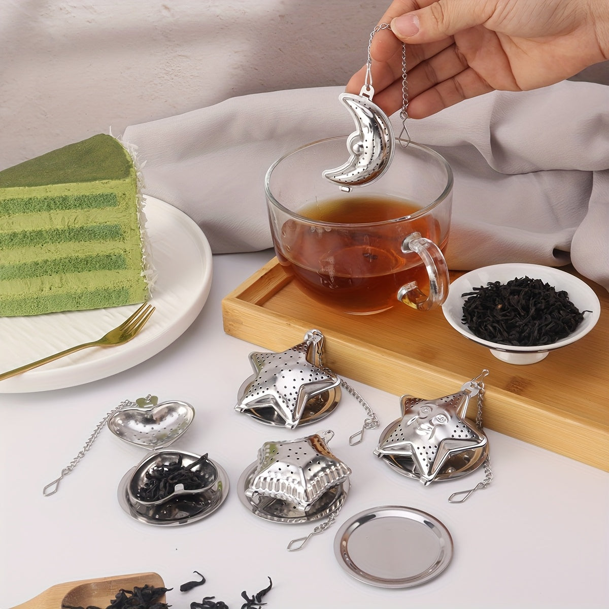 Set of 1 Stainless Steel Hanging Cup Filter Tea Ball with Tray, Available in Heart, Star, and Moon Shapes. Perfect for Ramadan Tea Time. These Creative Tea Balls in Various Shapes are Ideal for Office, Kitchen, Baking, and Special Occasions like Ramadan