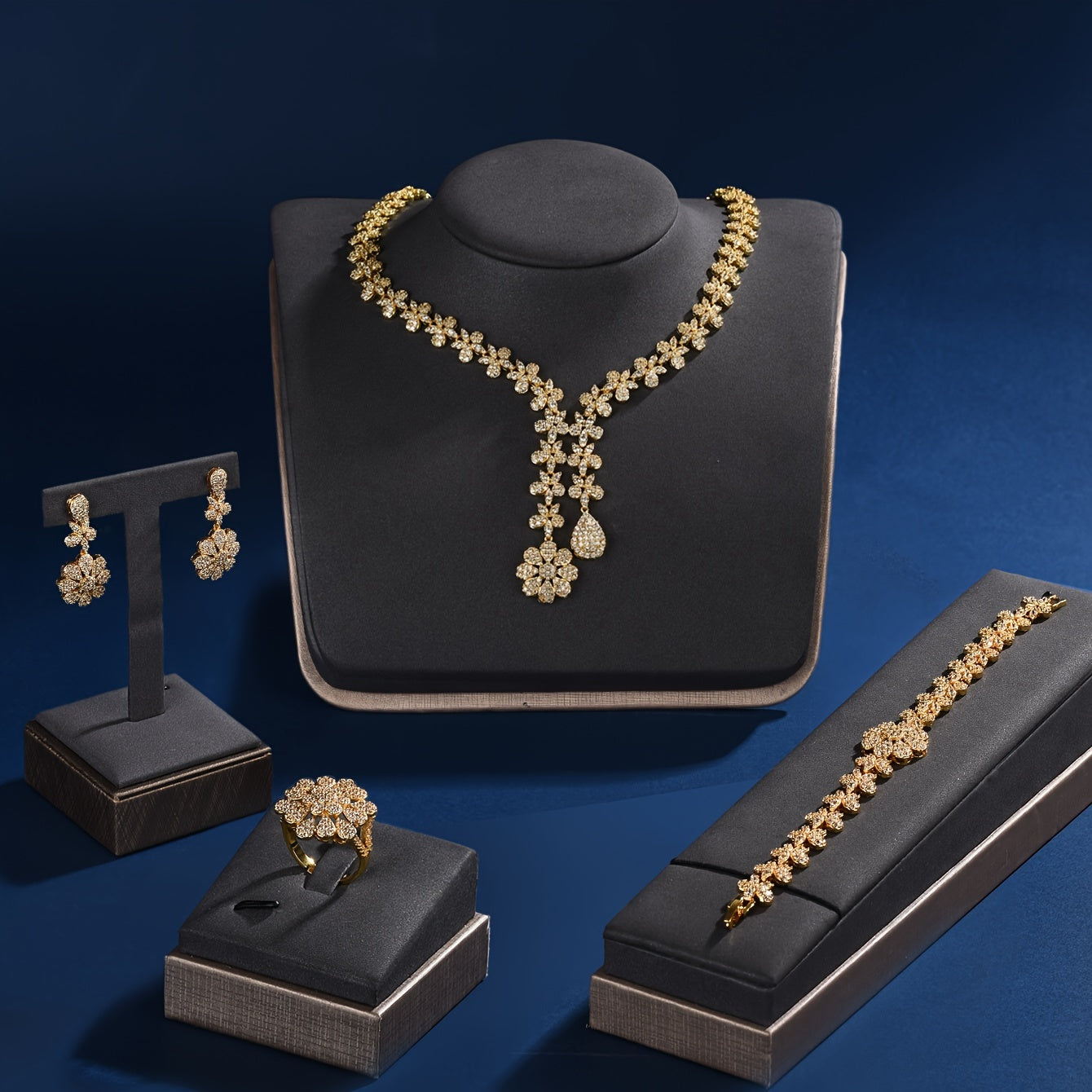 Luxurious 18K Gold Plated Copper Jewelry Set for Women featuring Synthetic Zirconia - Perfect for Parties and Holidays. This 5-Piece Set includes a Necklace, Bracelet, Earrings, and Ring, ideal for Weddings, Parties, and Thanksgiving celebrations.