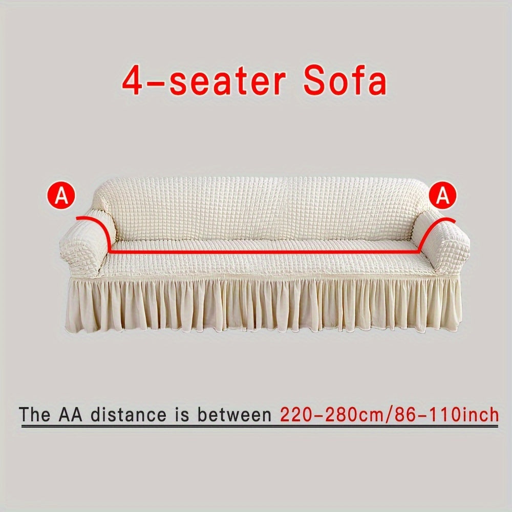 Stylish beige sofa cover with elastic skirt. Fits all sofa sizes and is machine washable. Perfect for any room decor. Great for living room sofas.