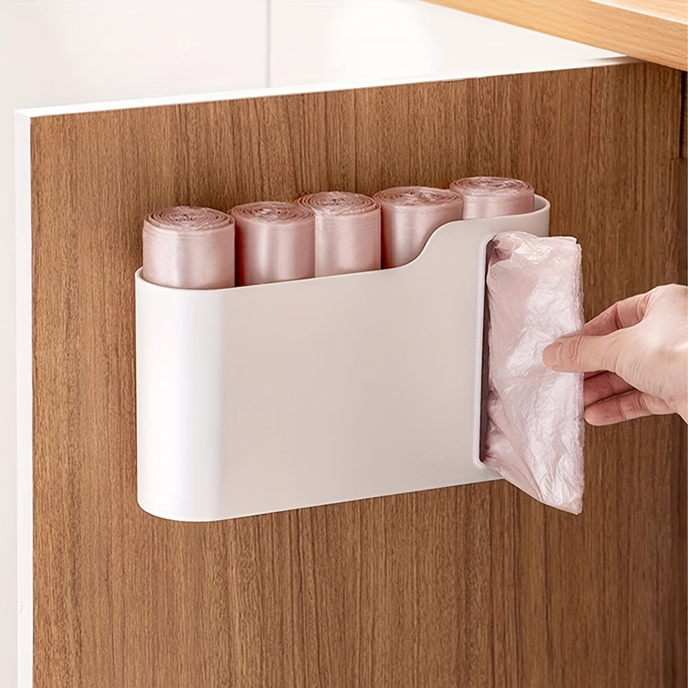 Get organized with the 1pc Plastic Bag Holder! This wall-mounted Garbage Bag Storage Box is a multifunctional Trash Bag Dispenser perfect for storing plastic wrap and roll paper in your kitchen and bathroom. Keep your home tidy with this handy organizer