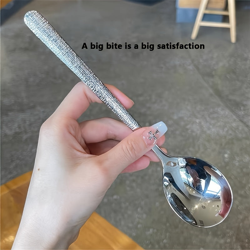 Durable stainless steel spoon with hammered round head design - ideal for kitchen and restaurant use. Easy to clean with a mirror polished finish. Suitable for soups, rice, and desserts.