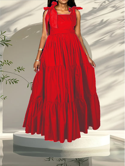 Stylish summer maxi dress for women with bow tie straps, cinched waist, solid color, and machine washable.