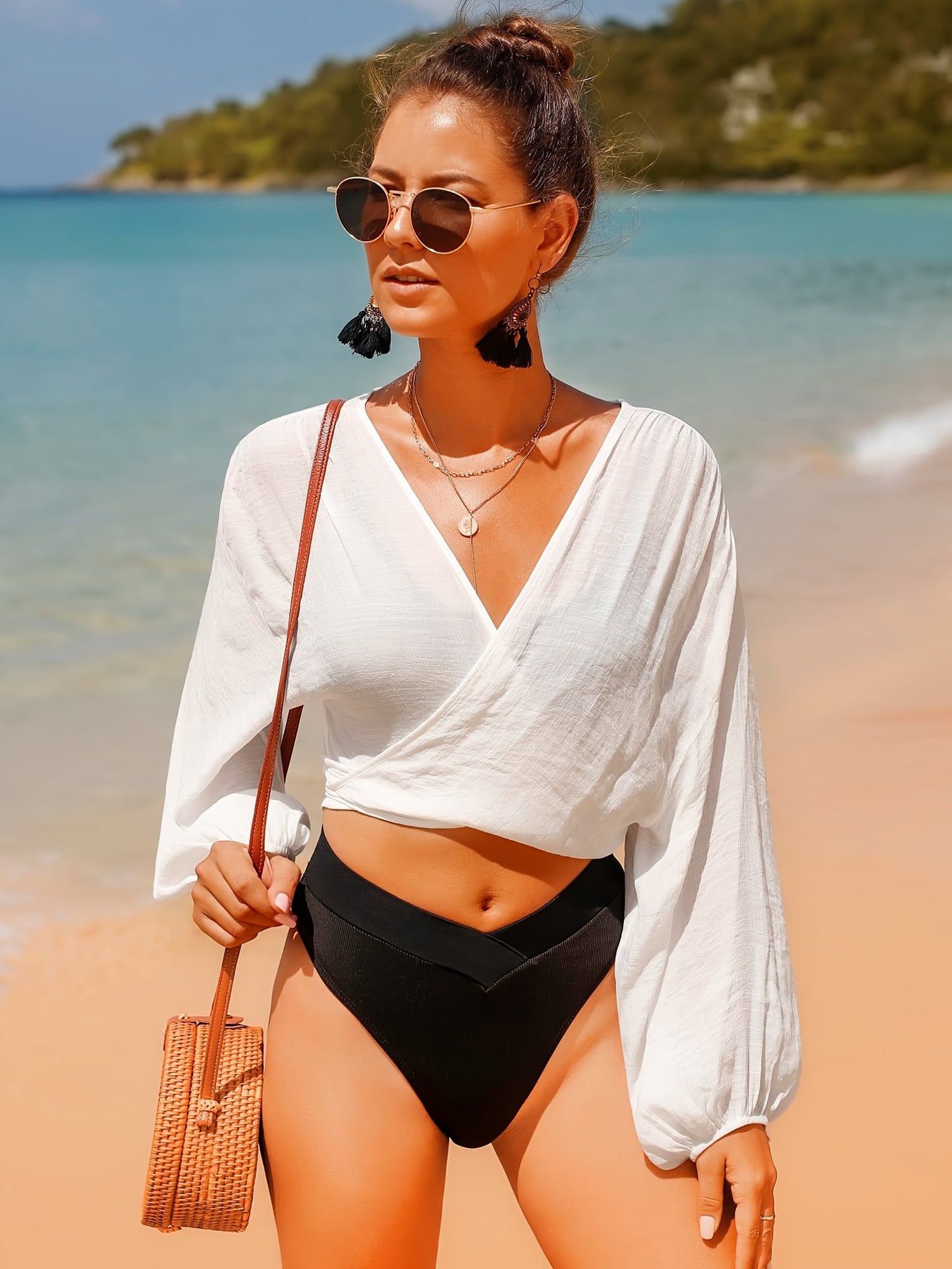 Women's swimwear cover up top with long sleeves and self-tie design for women.