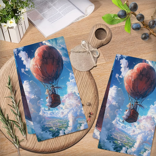 Pair of two super-soft kitchen towels showcasing an animated couple inside a heart-shaped hot air balloon. These highly absorbent dish towels are ideal for holiday decorating and can be easily cleaned in the washing machine. Each towel measures