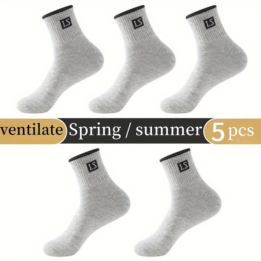 5 pairs of men's trendy solid crew socks, breathable and comfy for outdoor and all-season wear.